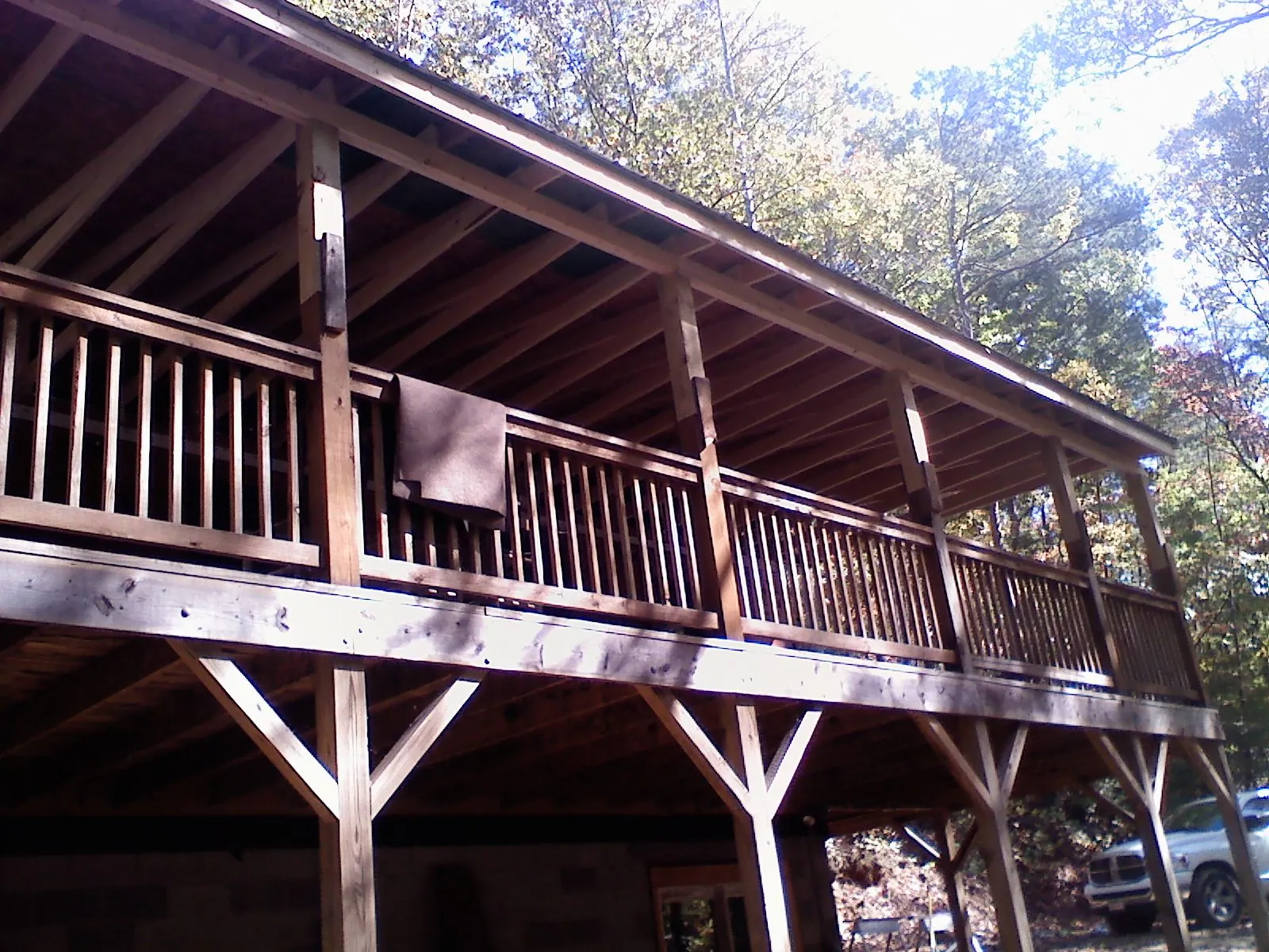 Timber framing under a new elevated porch and deck — Roof Leak Repair in Perkins by Roofing Brothers